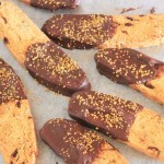 Dark Chocolate-Dipped Cranberry and Pumpkin Seed Biscotti | Brighten up your Christmas gifts this year with a simple but beautiful biscotti recipe - chocolate optional but totally recommended! | Veggie Mama